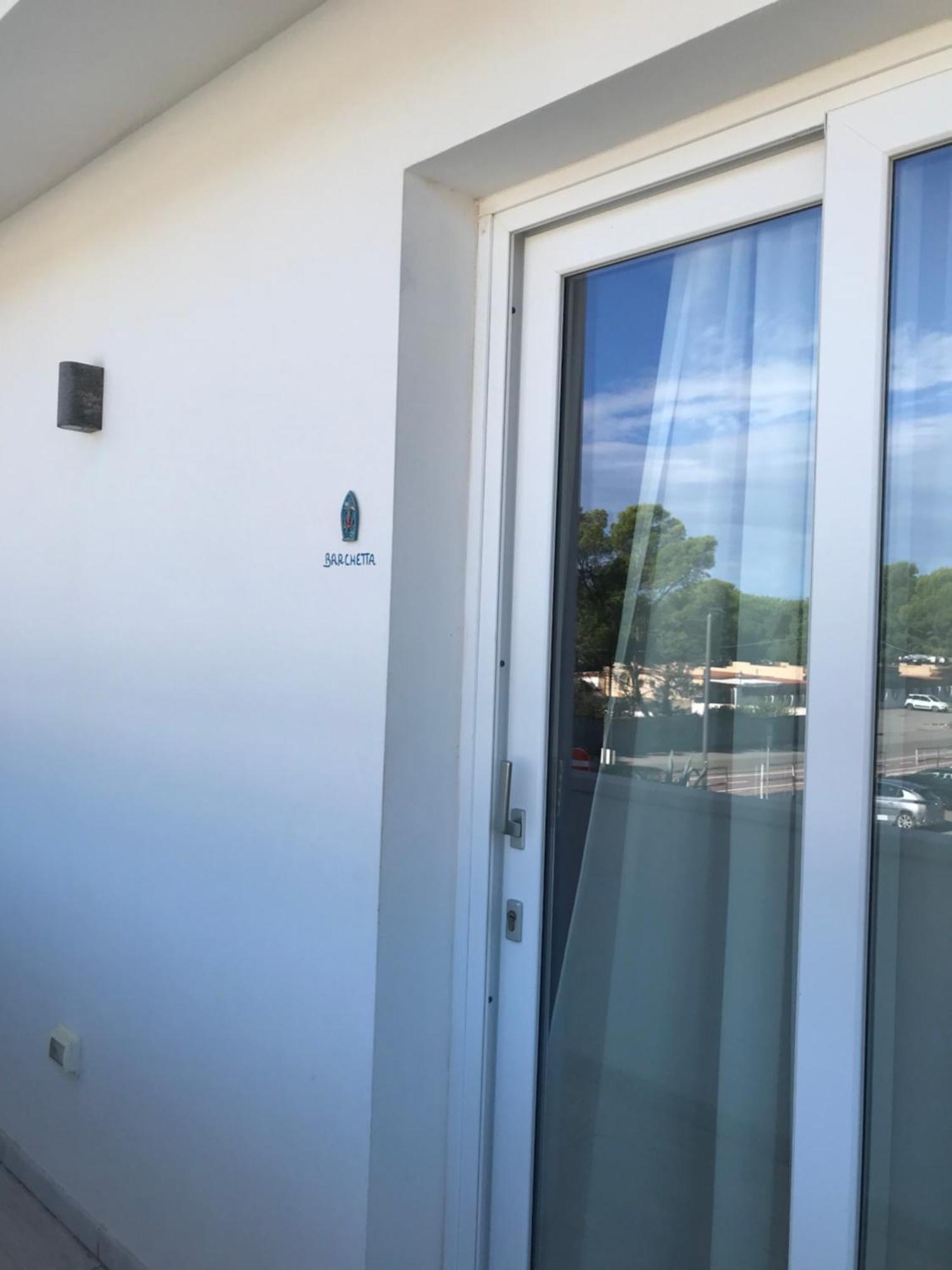 Case Vacanze "Bianco Mare" Porto Pino Pokoj fotografie