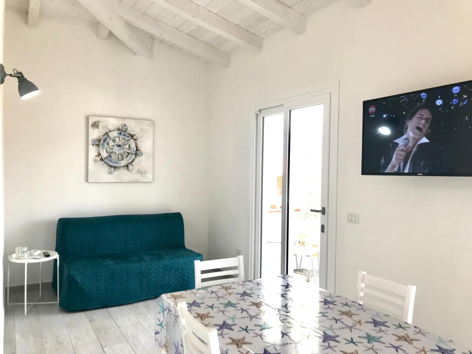 Case Vacanze "Bianco Mare" Porto Pino Pokoj fotografie