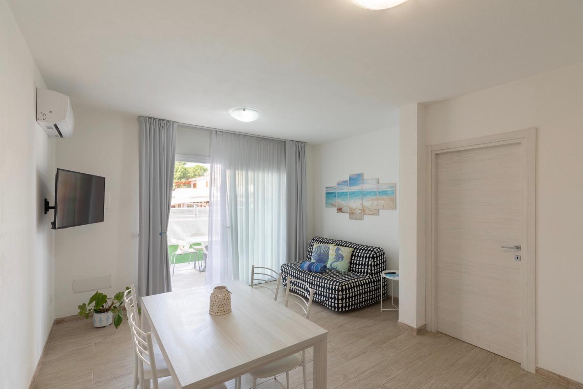 Case Vacanze "Bianco Mare" Porto Pino Pokoj fotografie
