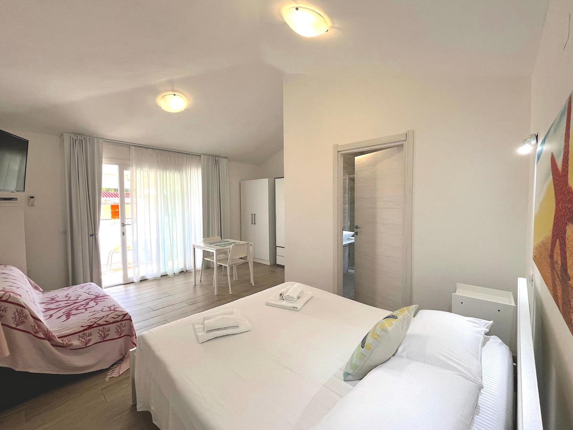 Case Vacanze "Bianco Mare" Porto Pino Pokoj fotografie
