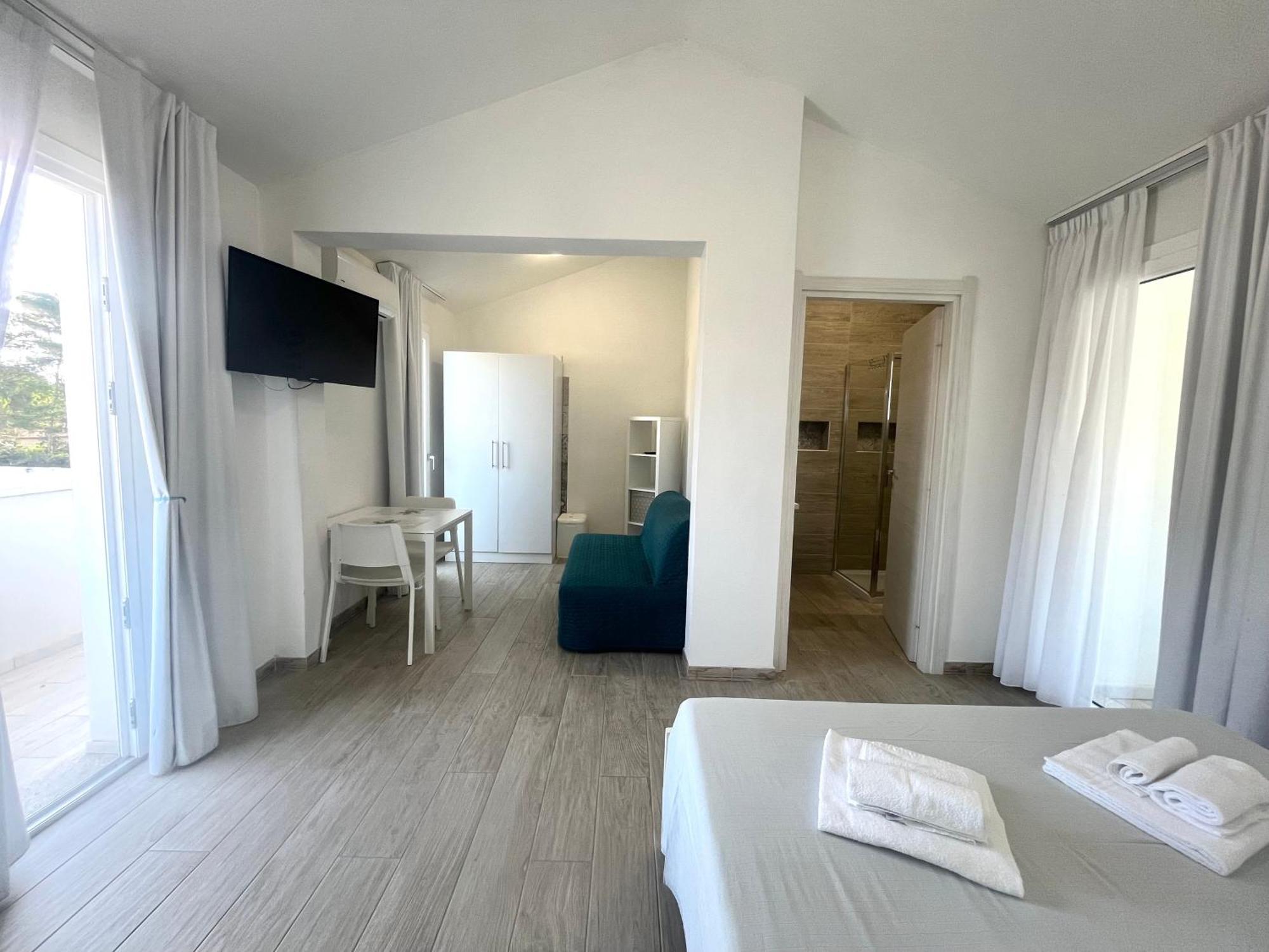 Case Vacanze "Bianco Mare" Porto Pino Pokoj fotografie